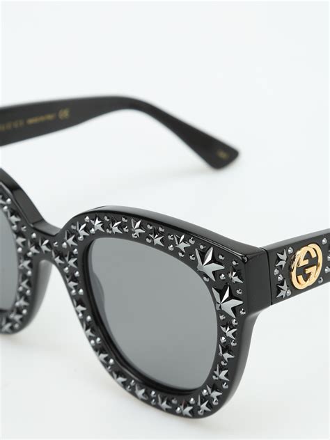 gucci sunglasses stars on arm